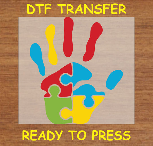 "Colorful Handprint DTF Transfer featuring a handprint design with puzzle pieces for autism awareness"