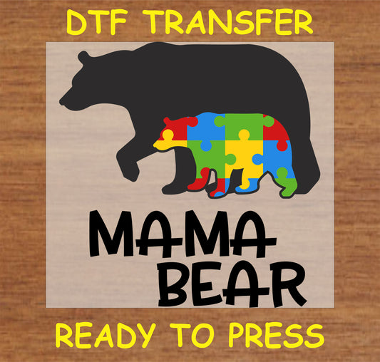 "Mama Bear Autism Awareness DTF Transfer with colorful puzzle piece cub design"