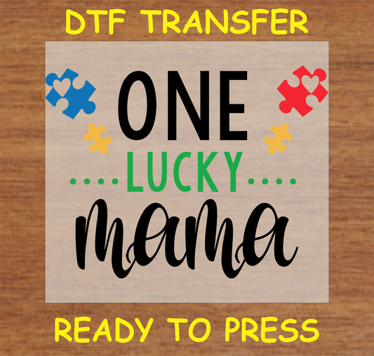 "One Lucky Mama DTF Transfer with autism awareness puzzle pieces"