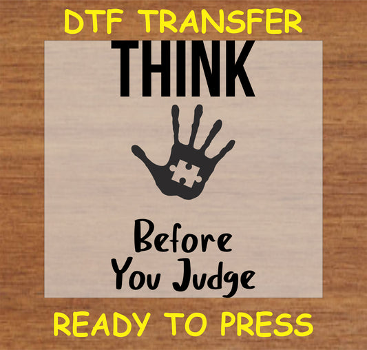 "Think Before You Judge DTF Transfer with handprint puzzle piece design for autism awareness"