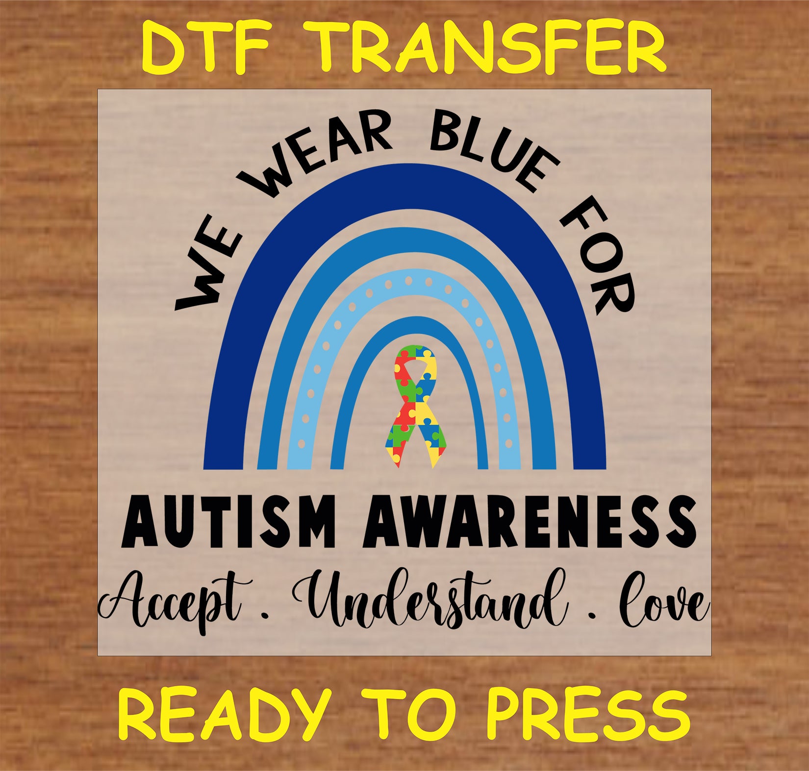 "We Wear Blue for Autism Awareness DTF Transfer with blue rainbow and puzzle piece ribbon"