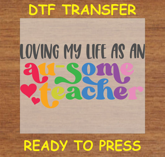 "Loving My Life as an Au-Some Teacher DTF Transfer with colorful text and heart design for autism awareness"