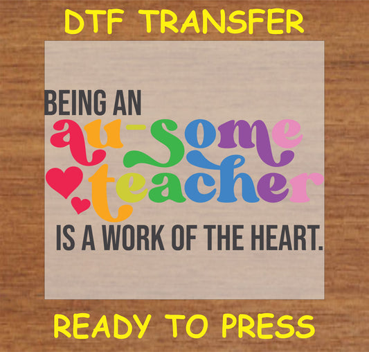 "Being an Au-Some Teacher is a Work of the Heart DTF Transfer with colorful text and heart design for autism awareness"