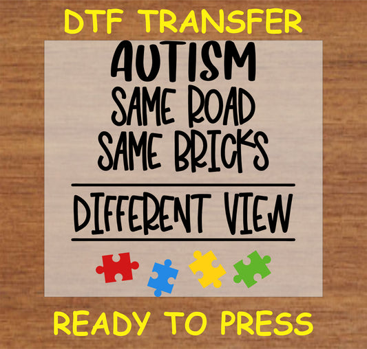 "Autism Awareness DTF Transfer with 'Same Road, Different View' message and colorful puzzle pieces"