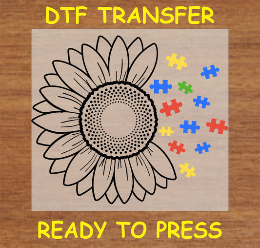 "Sunflower DTF Transfer with colorful autism puzzle pieces"