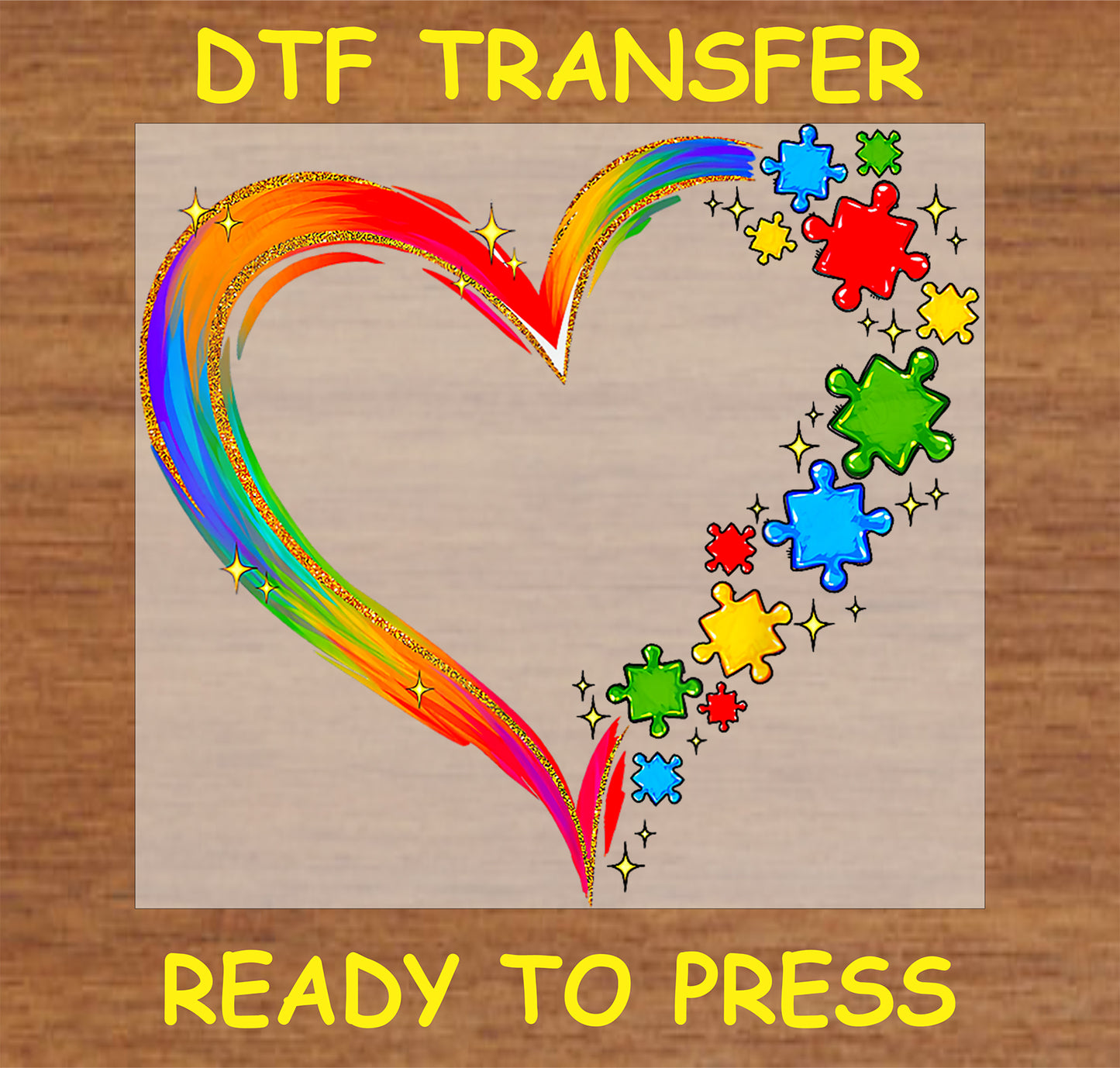 "Rainbow heart DTF transfer with colorful autism puzzle pieces for awareness and acceptance"