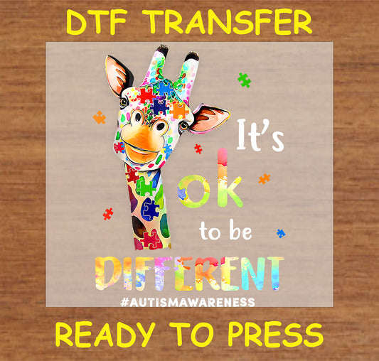 "It’s OK to Be Different DTF Transfer with a colorful giraffe and autism awareness puzzle pieces"