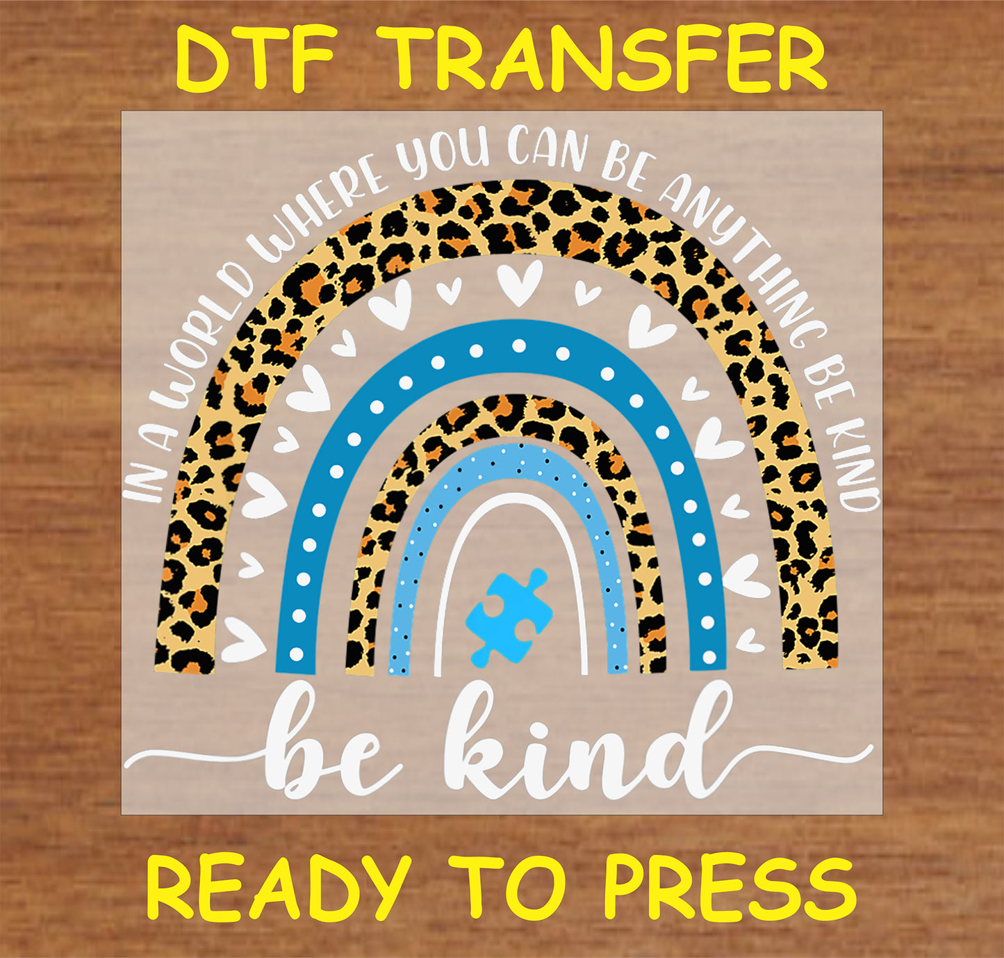 "Be Kind DTF Transfer with leopard and blue rainbow design and puzzle piece for autism awareness"