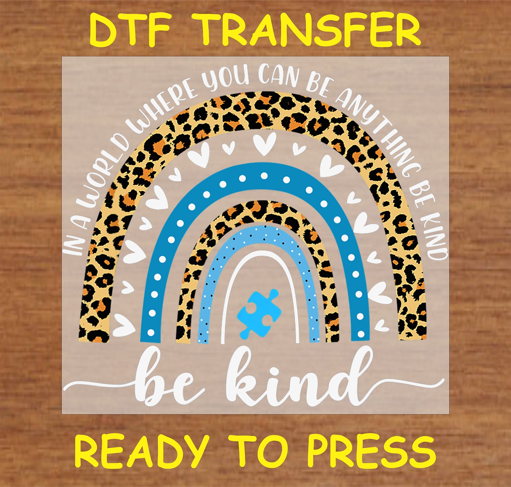 "Be Kind DTF Transfer with leopard and blue rainbow design and puzzle piece for autism awareness"