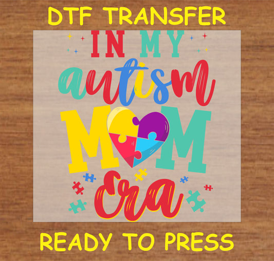 "In My Autism Mom Era DTF Transfer with colorful puzzle heart design promoting autism awareness and support"