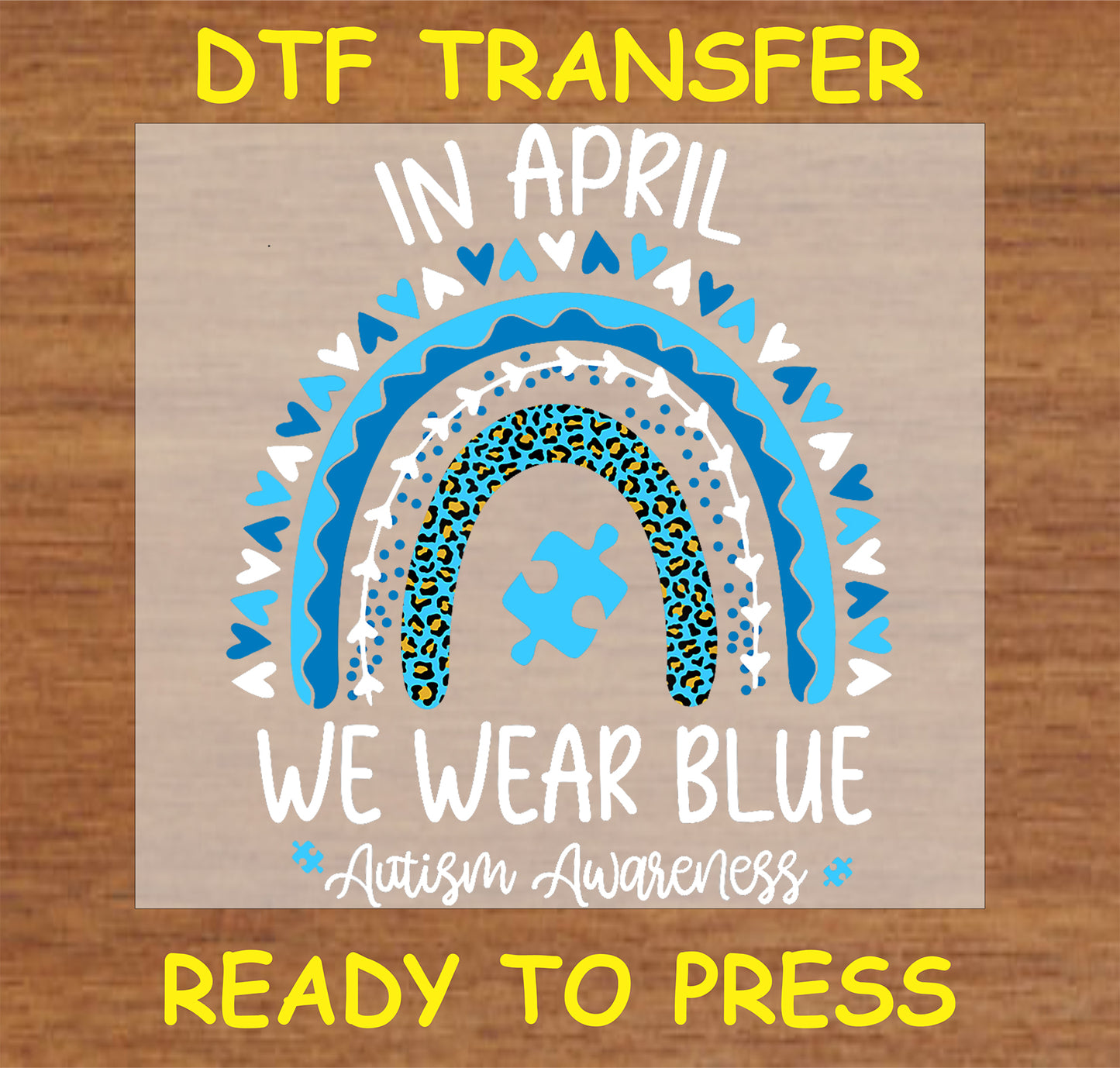 "In April We Wear Blue Autism Awareness DTF Transfer with blue rainbow and puzzle piece"