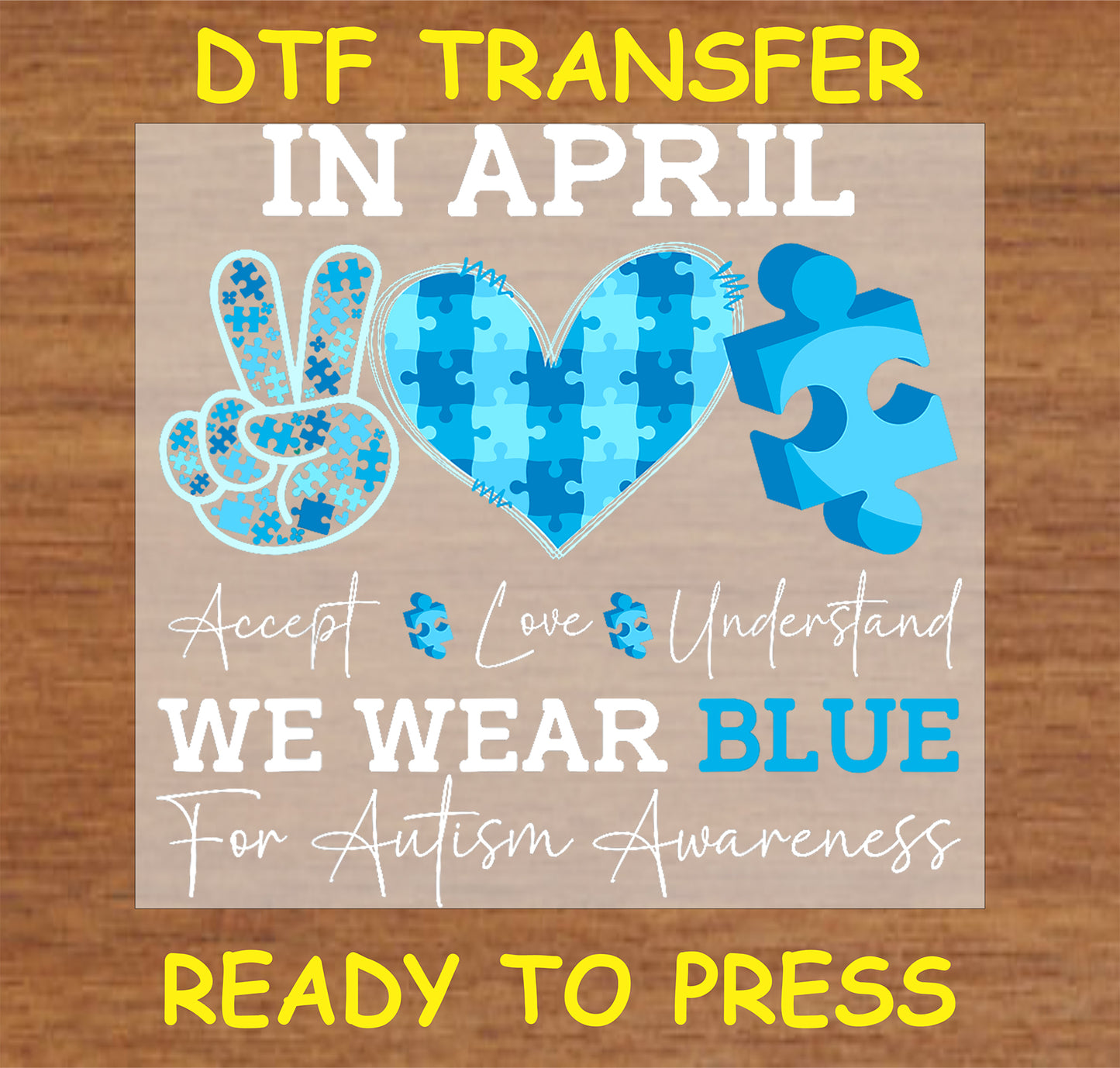 "In April We Wear Blue Autism Awareness DTF Transfer with peace, heart, and puzzle symbols"