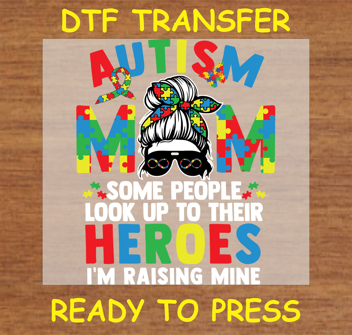 "Autism Mom DTF Transfer with Raising Heroes quote and puzzle piece design"