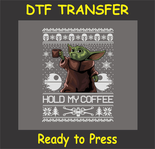 "Holiday DTF transfer featuring a cute alien holding a coffee cup with festive sweater design"