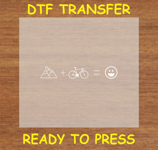 "Mountains + Bike = Happy DTF Transfer with simple mountain, bike, and smiley icon equation"