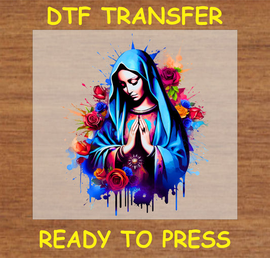 "Virgin Mary DTF Transfer with vibrant blue tones and floral accents, perfect for religious and spiritual apparel"