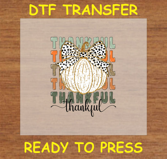 "Thankful Pumpkin DTF Transfer with golden pumpkin, polka dot bow, and 'Thankful' text for Thanksgiving and fall decor"