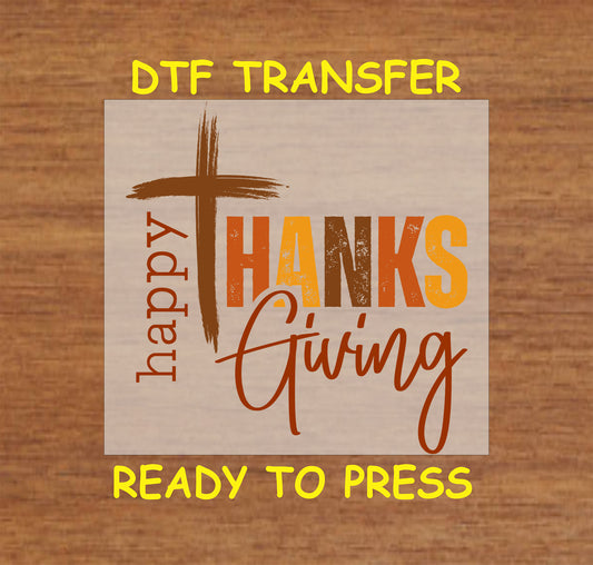 Thanksgiving-themed DTF transfer featuring a cross and the phrase "Happy Thanksgiving" in warm autumn tones.