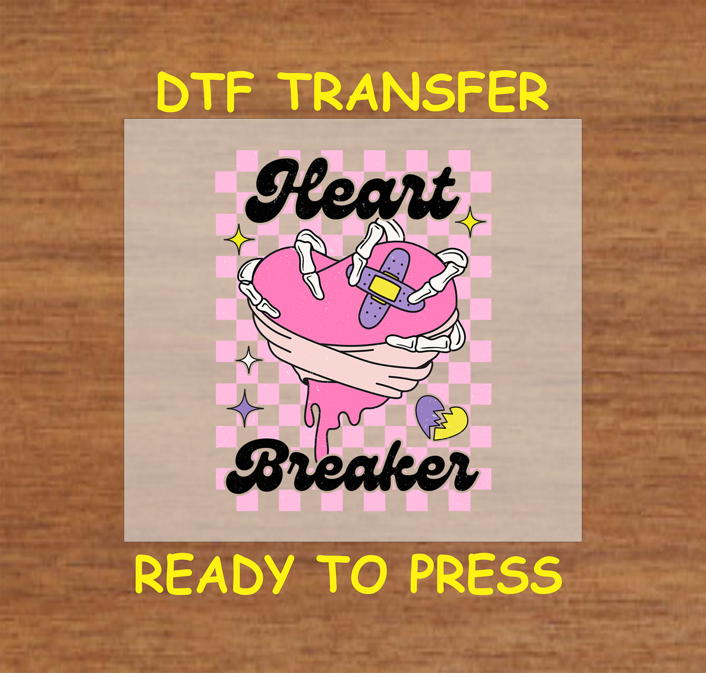 "Heartbreaker Anti-Valentine’s Day DTF transfer featuring a pink heart and bold typography."