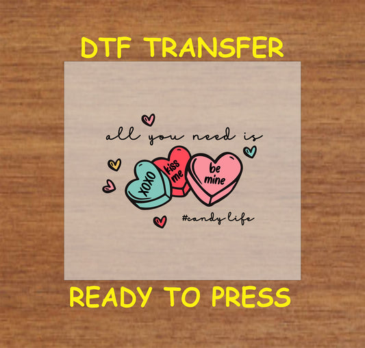 "Colorful candy hearts Valentine DTF transfer with phrases 'XOXO,' 'Kiss Me,' and 'Be Mine,' ready to press for crafts and apparel."