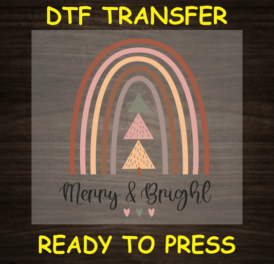 Merry & Bright DTF transfer featuring a pastel rainbow and Christmas trees.