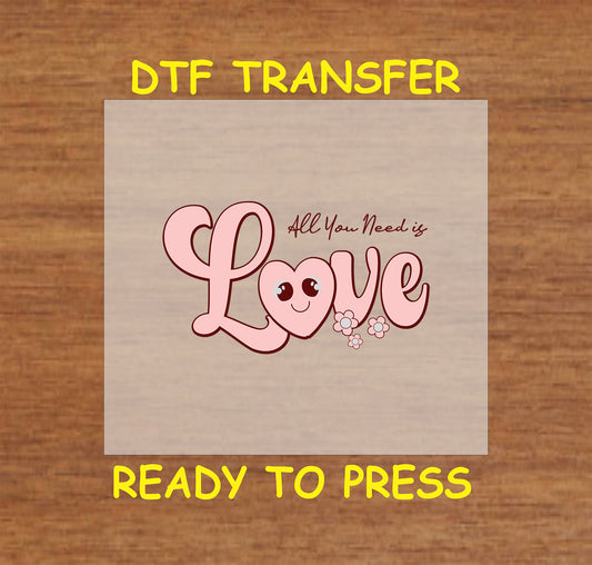 "All You Need is Love" retro design with smiling heart and flowers, ready-to-press DTF transfer.