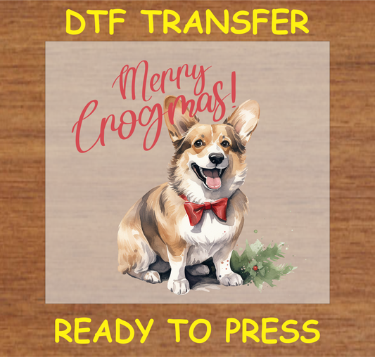 "Merry Corgmas!" DTF transfer featuring a Corgi in a red bow.