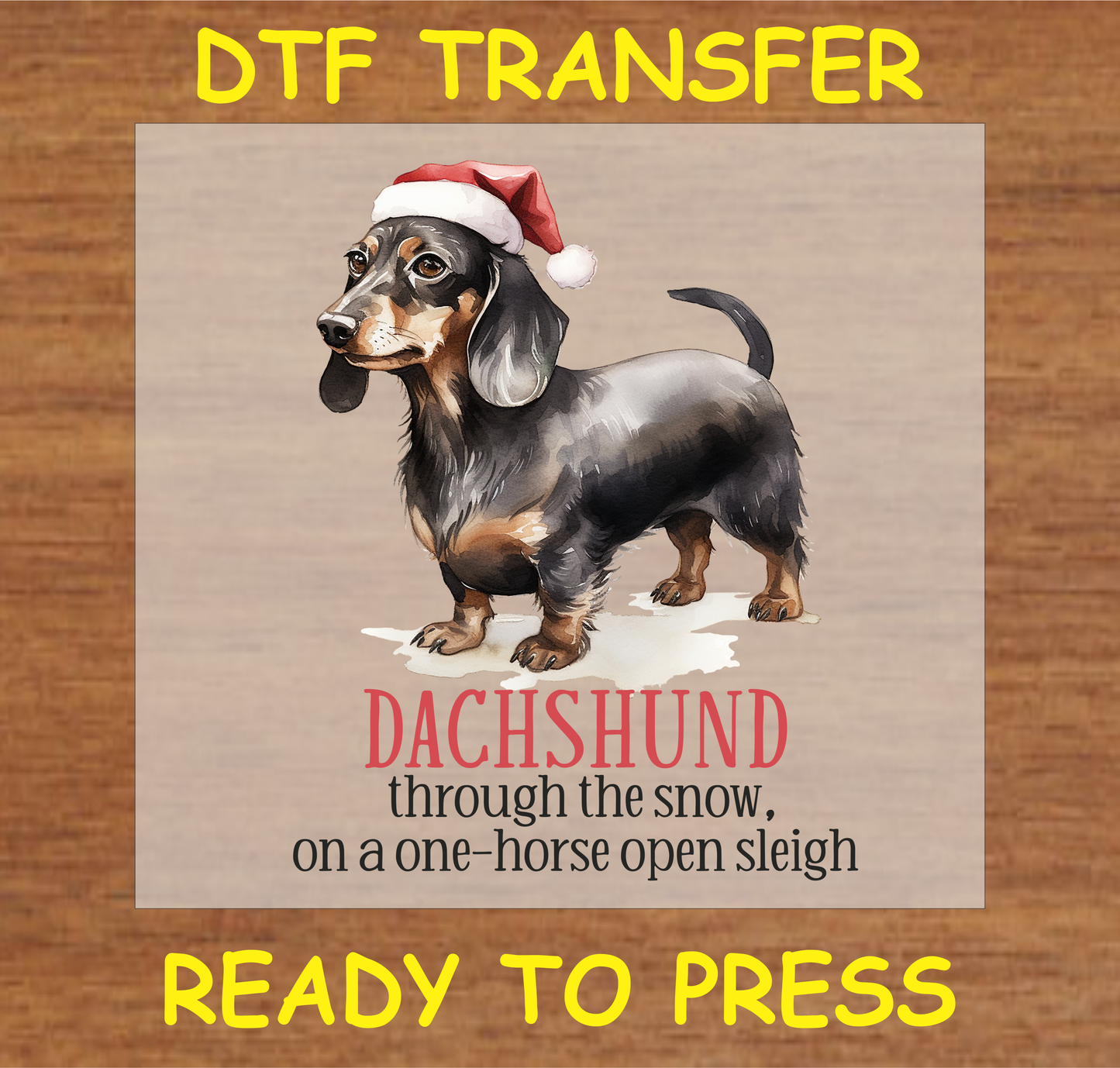 Dachshund wearing a Santa hat with the text "Dachshund Through the Snow" DTF transfer.