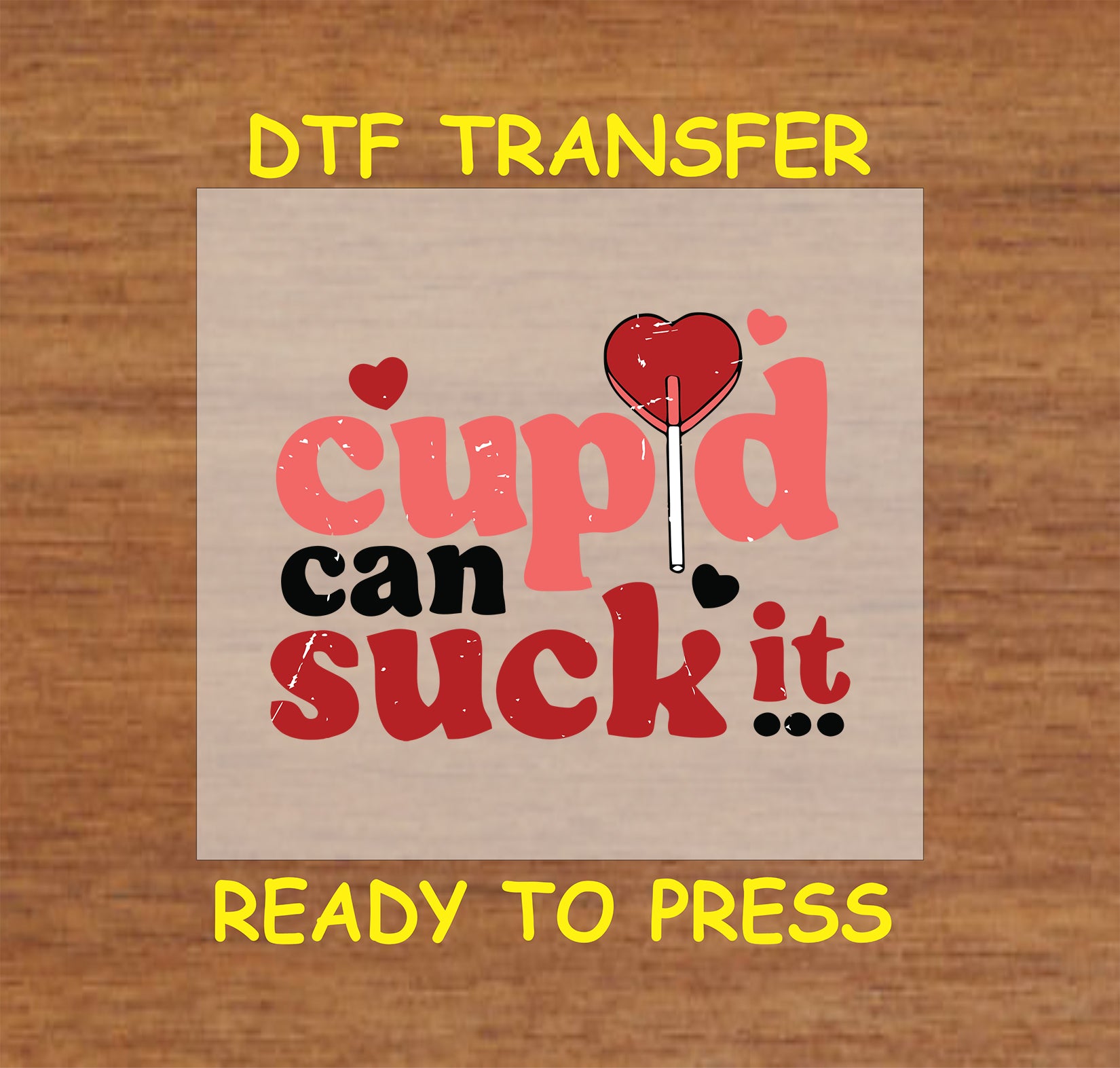 "DTF Transfer with bold text 'Cupid Can Suck It' and a heart-shaped lollipop design, perfect for anti-Valentine's Day apparel."