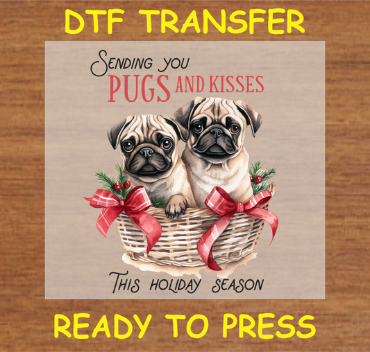 Two pugs in a festive basket with the text "Sending You Pugs and Kisses" DTF transfer.