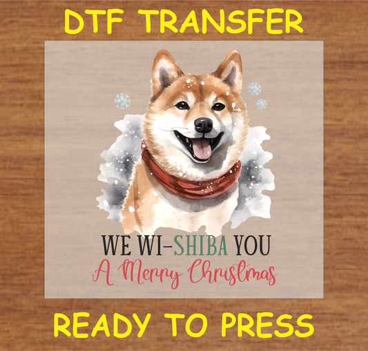 Shiba Inu dog with snowflakes and scarf, "We Wi-Shiba You A Merry Christmas" DTF transfer.