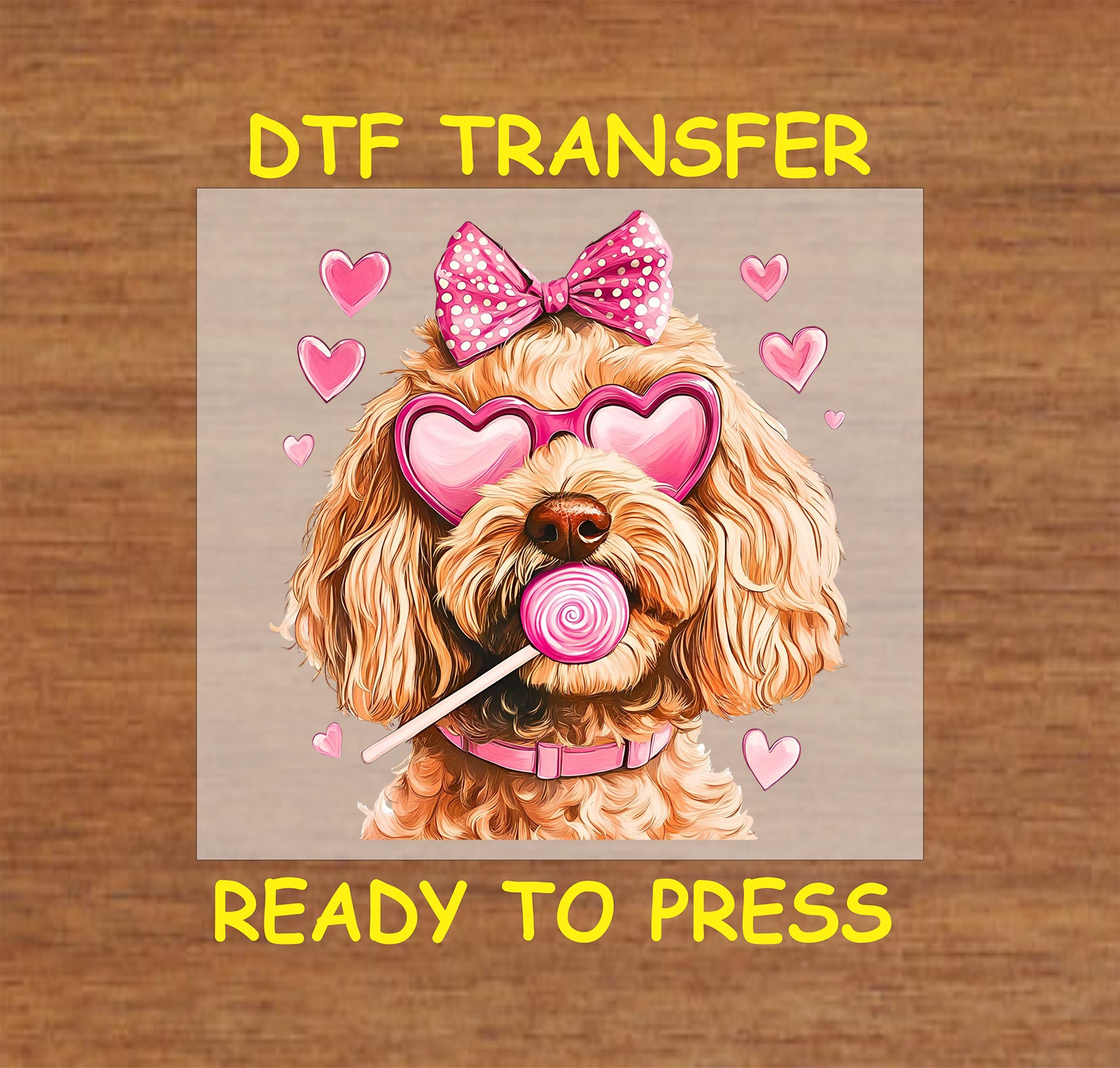 DTF transfer featuring a golden doodle dog wearing pink heart-shaped glasses, a polka-dot bow, and holding a lollipop, surrounded by pink hearts for Valentine's Day.