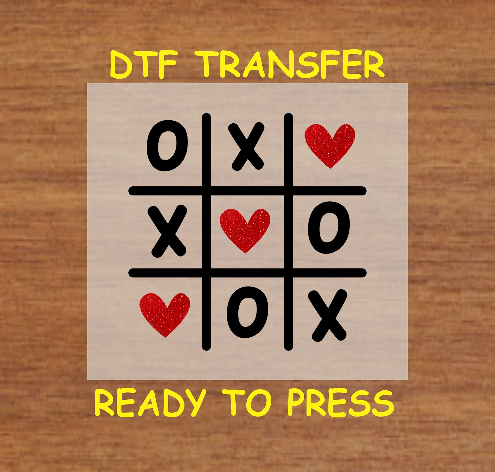 "Tic Tac Toe Love" DTF transfer featuring a tic-tac-toe grid with red glitter hearts and black X's and O's, perfect for Valentine's Day projects.