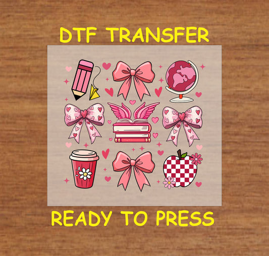 School-themed Valentine's Day DTF transfer featuring bows, books, pencils, globes, and apples with hearts and pink tones.