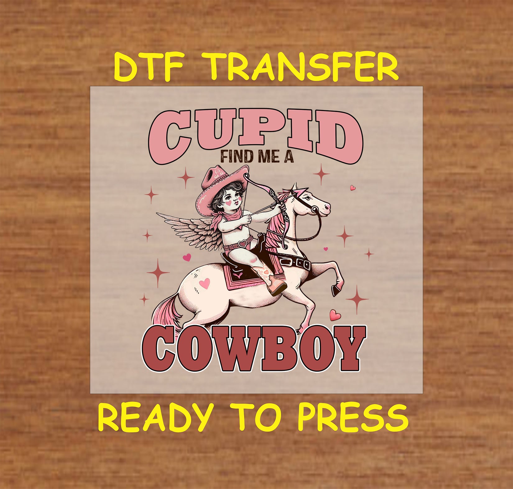 Retro "Cupid, Find Me a Cowboy" DTF transfer featuring a cupid on horseback with hearts and stars, ideal for Valentine's Day apparel.