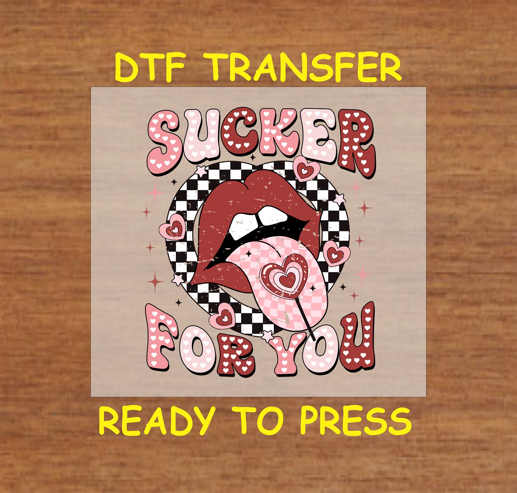 "Sucker For You" Valentine's Day DTF transfer featuring bold lips, a heart-shaped lollipop, and a retro checkered design surrounded by pink and red hearts.