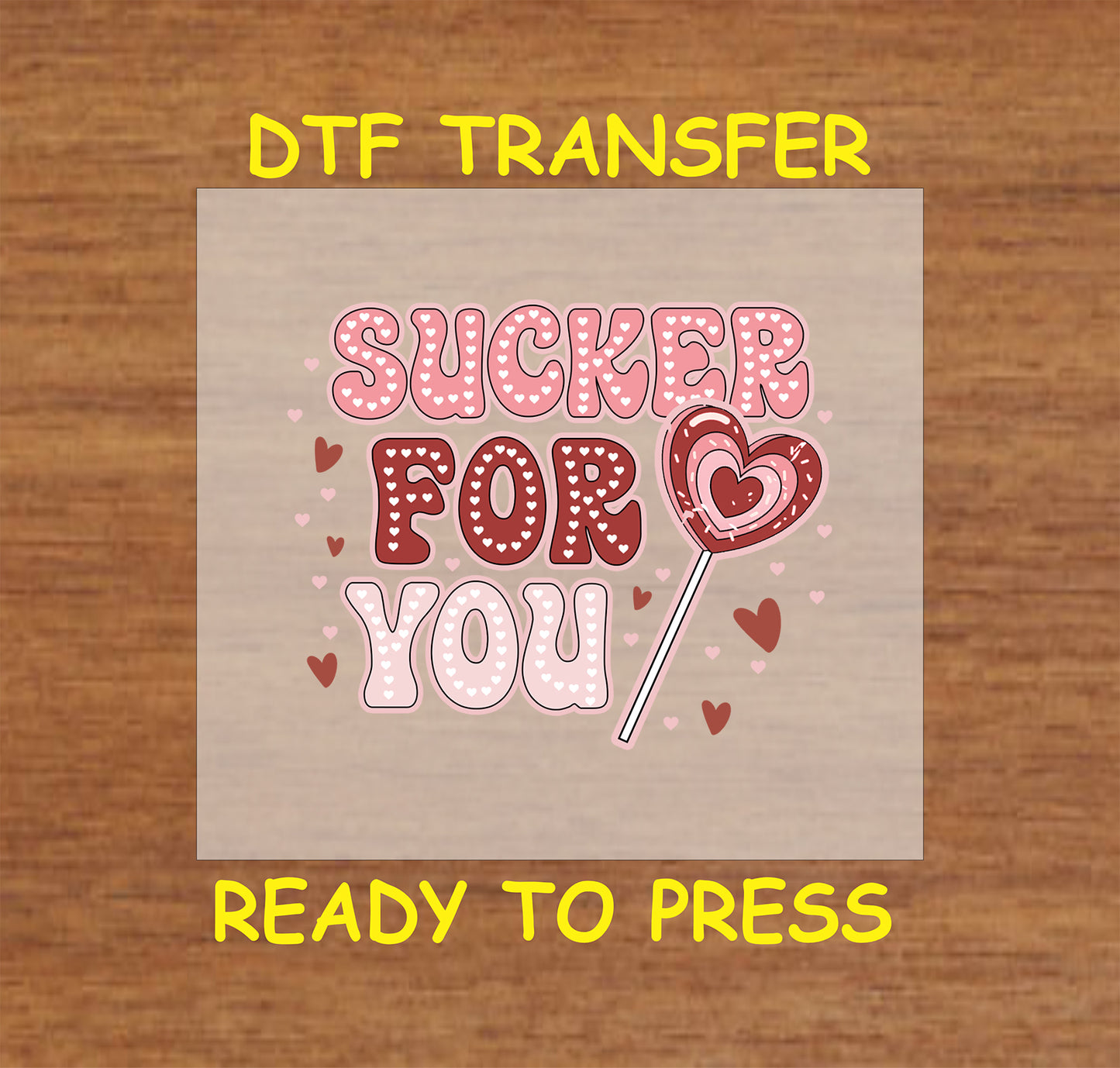 "Sucker For You" Valentine's Day DTF transfer with polka dot lettering, a heart-shaped lollipop, and floating heart accents.