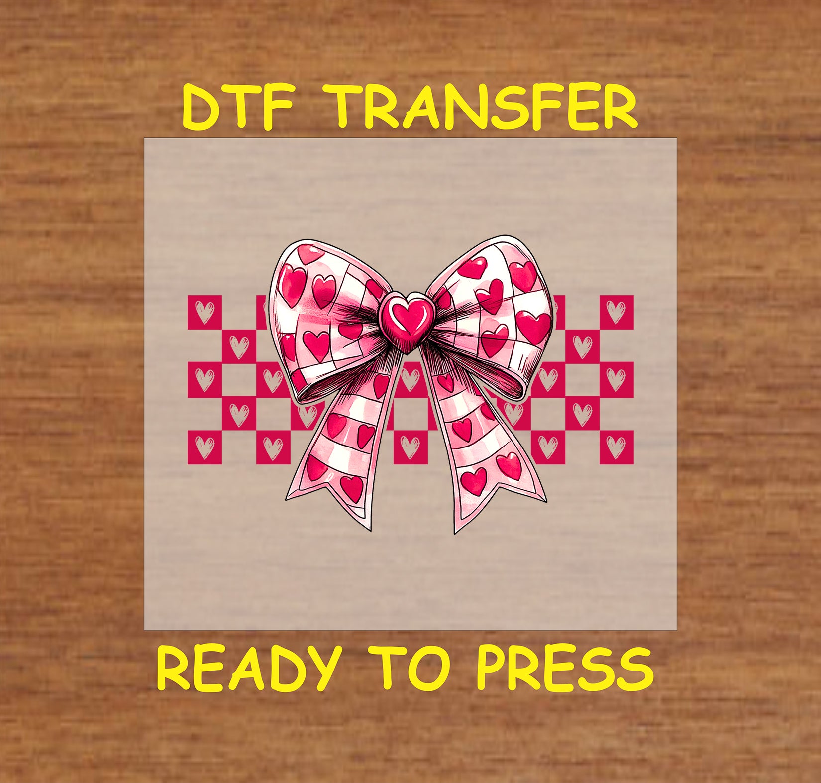 Valentine's Bow DTF Transfer featuring a pink and red heart-patterned bow with a checkerboard background.