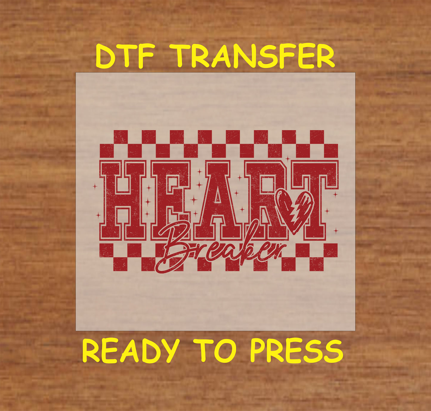 Heartbreaker DTF transfer featuring bold distressed text, a broken heart graphic, and a checkerboard pattern, perfect for Valentine's Day apparel.