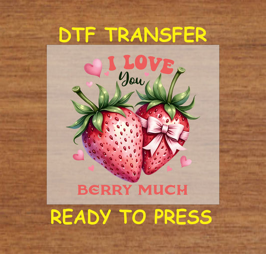 I Love You Berry Much DTF Transfer with two strawberries, one tied with a pink bow, surrounded by hearts and love-themed text.