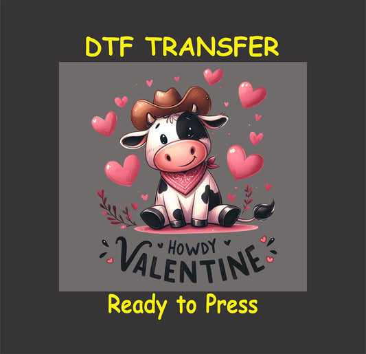 Howdy Valentine DTF Transfer featuring a cute cow in a cowboy hat with pink hearts and bandana, perfect for Valentine’s Day crafts.