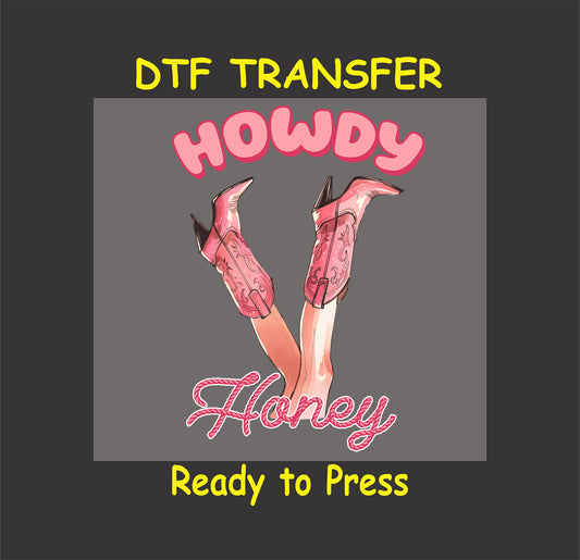 Howdy Honey DTF Transfer featuring pink cowboy boots with bold lettering, perfect for Valentine’s Day apparel.