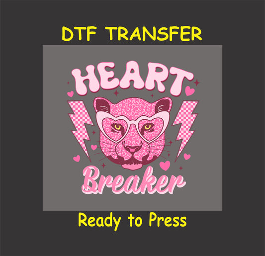 Pink leopard with heart-shaped glasses, surrounded by lightning bolts and the words "Heart Breaker." A bold Valentine’s Day design for custom apparel.