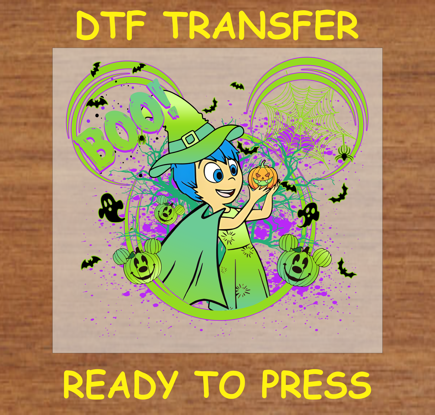 Blue-haired witch holding a pumpkin with the text 'BOO!' Halloween DTF transfer.