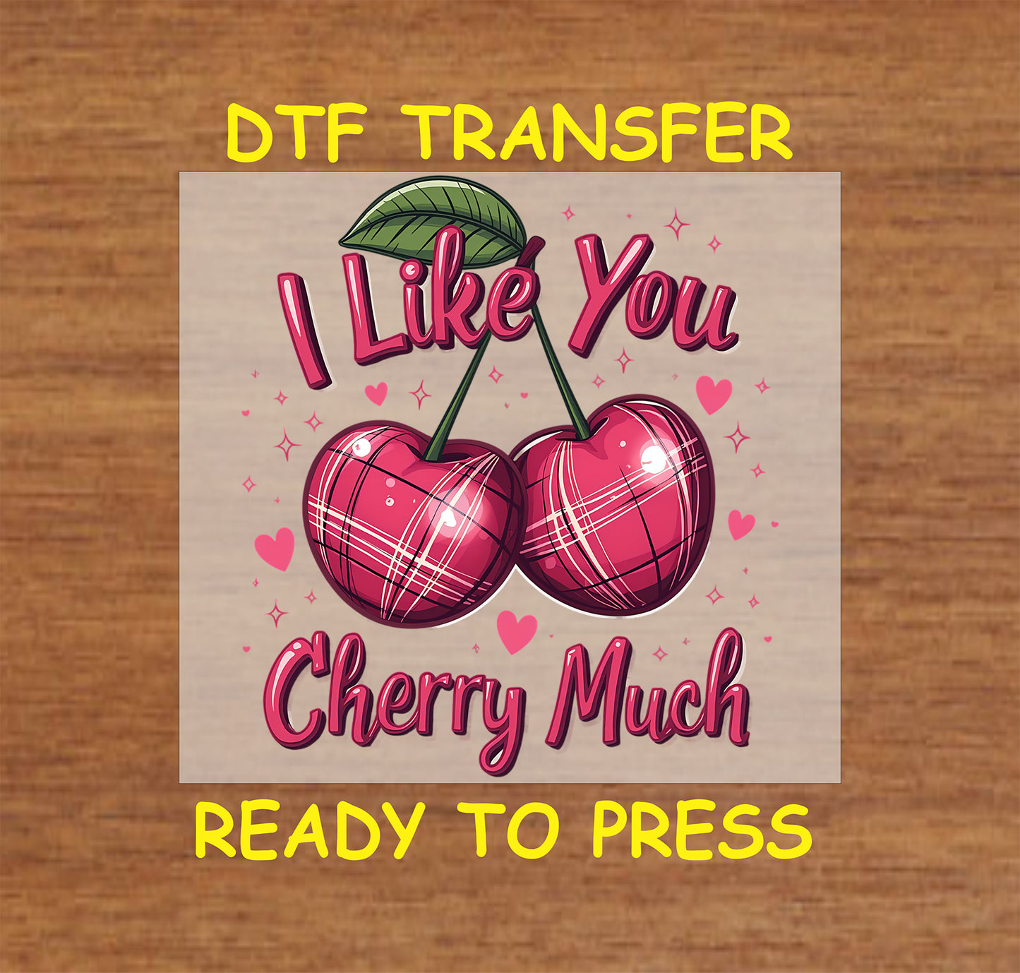 DTF transfer featuring two plaid cherries with green leaves, surrounded by pink hearts and the bold text "I Like You Cherry Much."