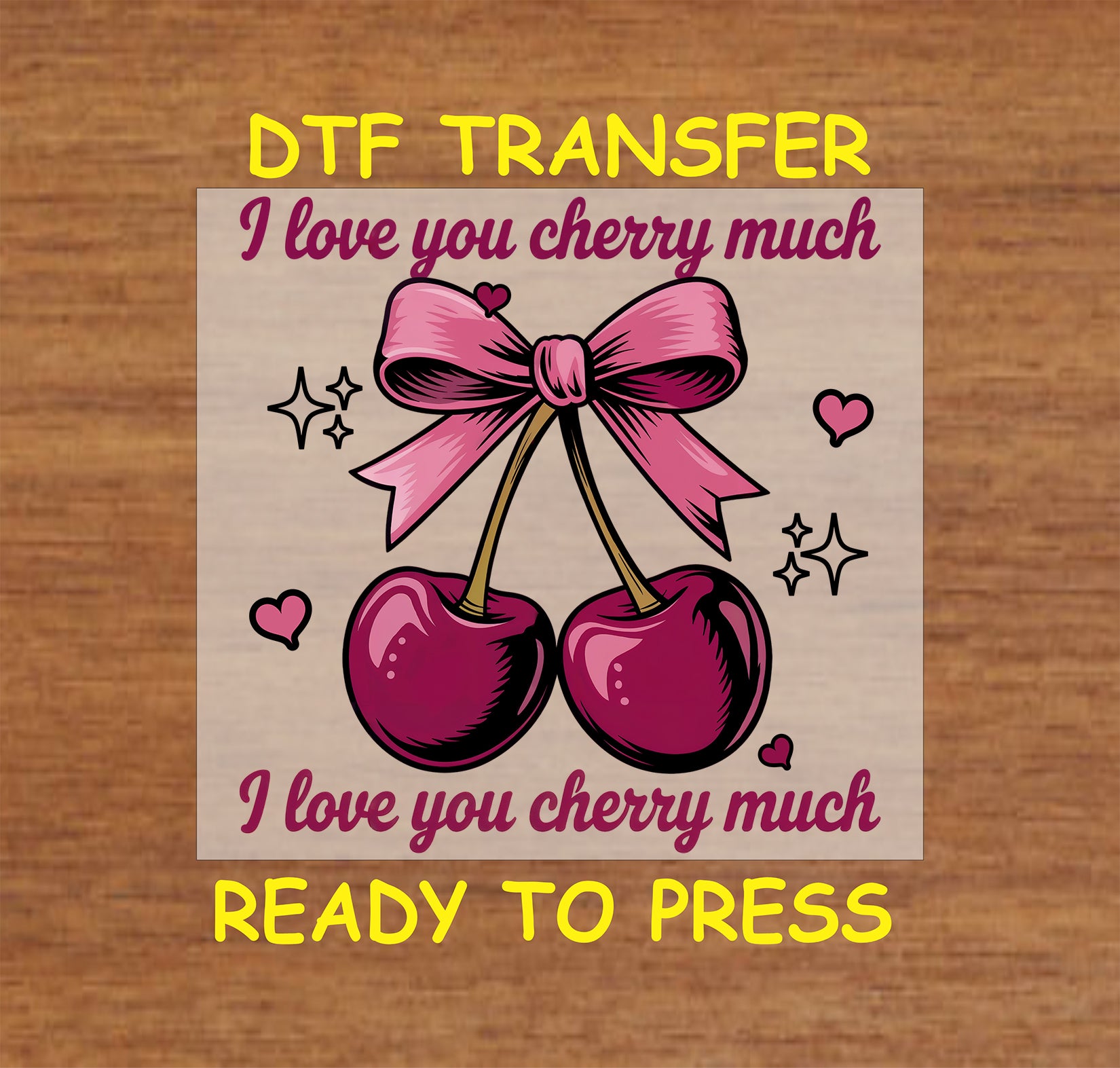 DTF transfer featuring two deep burgundy cherries tied with a pink bow, surrounded by the phrase "I Love You Cherry Much" with hearts and sparkles.