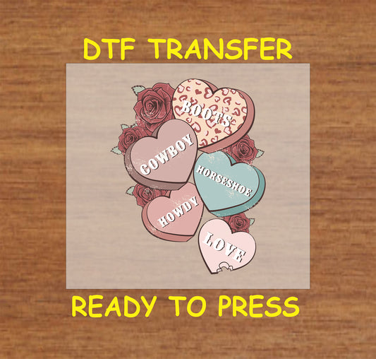 Western Valentine DTF transfer with cowboy-themed candy hearts, rustic roses, and love-inspired text.