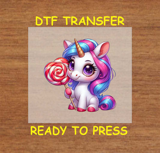 Cute unicorn holding a red and white swirled lollipop DTF transfer.