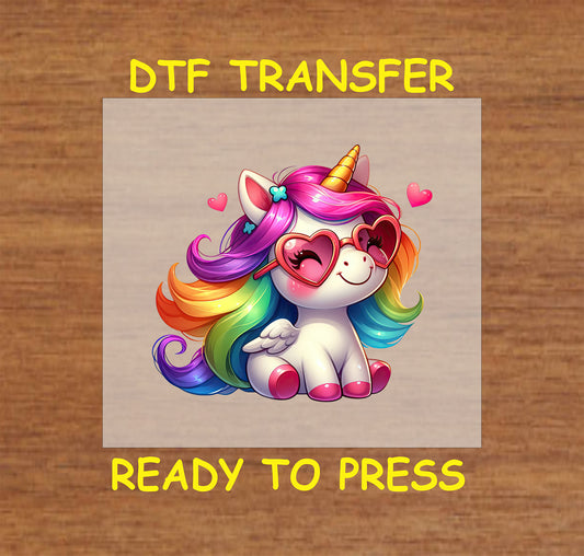 Cute rainbow unicorn with heart sunglasses and floating hearts DTF transfer.