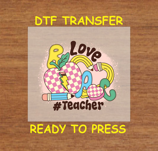 Love #Teacher Valentine's design with an apple, pencil, and hearts.